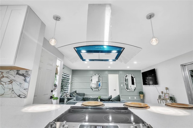 1384 S Hillcrest Ave, Clearwater, FL 33756 - kitchen featuring extractor fan, stove, open floor plan, recessed lighting, and light countertops