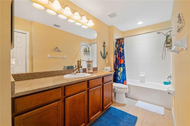 6677 84th Ave N, Pinellas Park, FL 33781 - bathroom with vanity, tile patterned flooring, and shower / tub combo