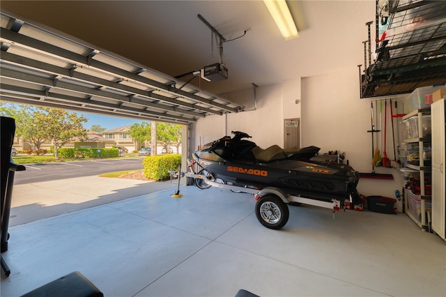 6677 84th Ave N, Pinellas Park, FL 33781 - garage featuring a garage door opener