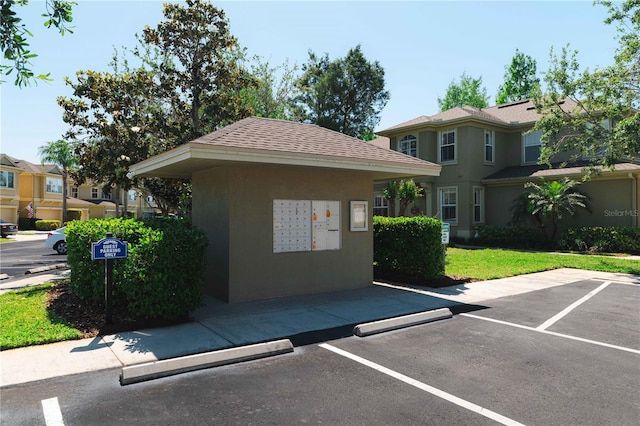 6677 84th Ave N, Pinellas Park, FL 33781 - uncovered parking lot featuring mail area