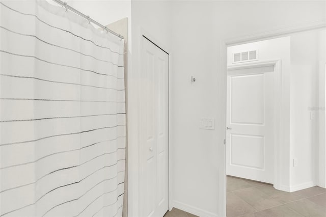 43250 Water Bird Way Unit 5921, Punta Gorda, FL 33982 - hall featuring baseboards and light tile patterned floors