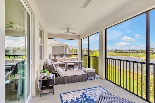 43250 Water Bird Way Unit 5921, Punta Gorda, FL 33982 - sunroom featuring ceiling fan, an outdoor hangout area, and a water view