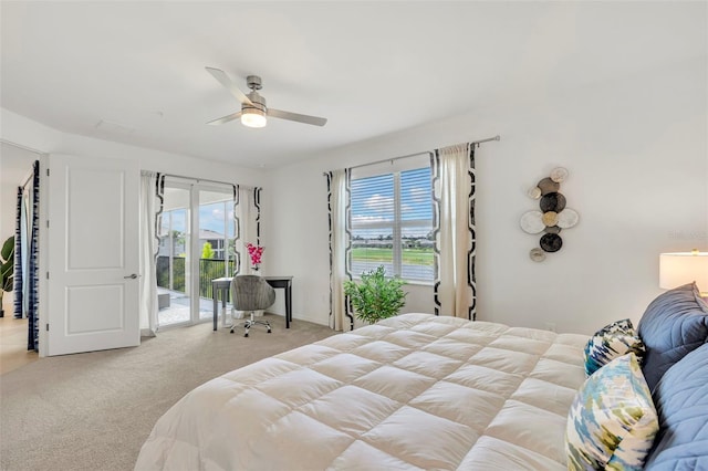 43250 Water Bird Way Unit 5921, Punta Gorda, FL 33982 - bedroom featuring access to exterior, carpet, and a ceiling fan