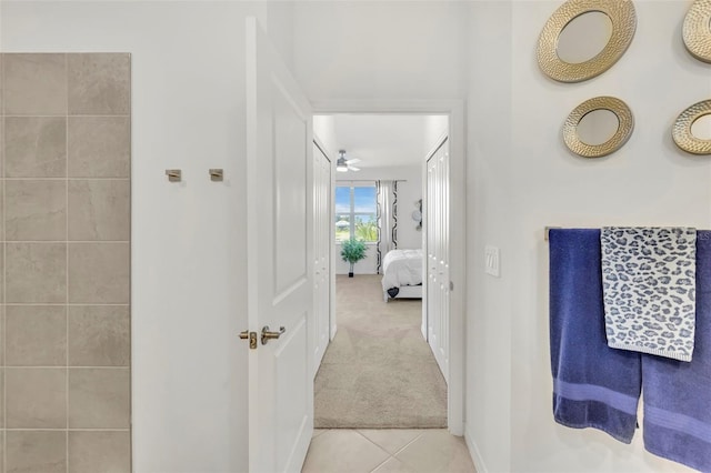 43250 Water Bird Way Unit 5921, Punta Gorda, FL 33982 - corridor with tile patterned flooring and carpet floors