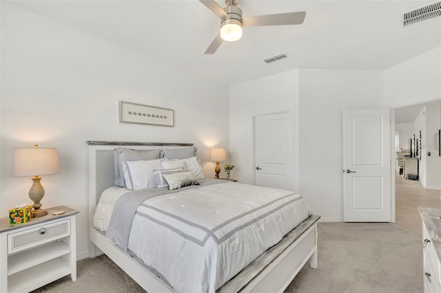 43250 Water Bird Way Unit 5921, Punta Gorda, FL 33982 - bedroom with light colored carpet and a ceiling fan