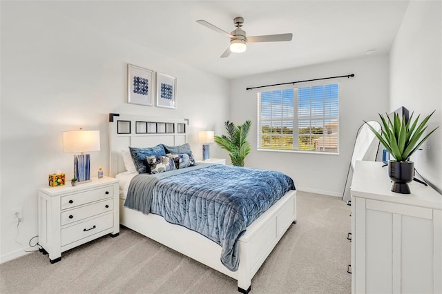 43250 Water Bird Way Unit 5921, Punta Gorda, FL 33982 - bedroom with light colored carpet and a ceiling fan