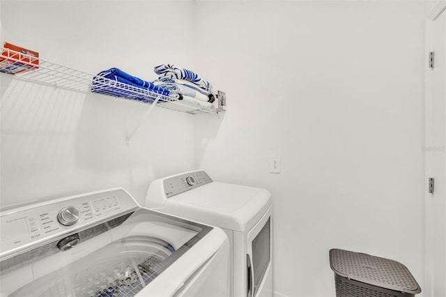 43250 Water Bird Way Unit 5921, Punta Gorda, FL 33982 - laundry area featuring washer and clothes dryer