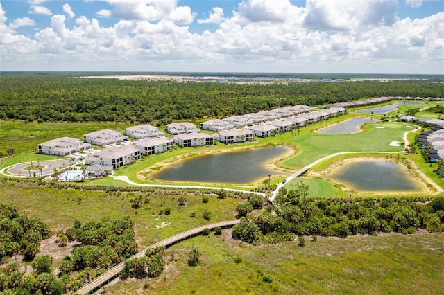 43250 Water Bird Way Unit 5921, Punta Gorda, FL 33982 - aerial perspective of suburban area with a nearby body of water and a local golf course