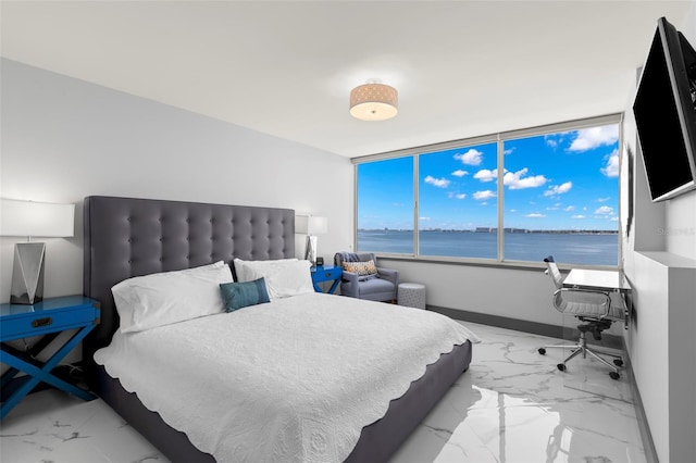5153 Isla Key Blvd S Unit 415, Saint Petersburg, FL 33715 - bedroom featuring marble finish floors and baseboards
