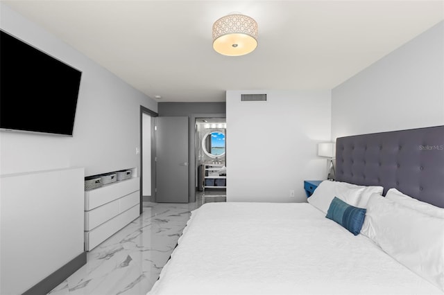 5153 Isla Key Blvd S Unit 415, Saint Petersburg, FL 33715 - bedroom featuring light marble finish floors and baseboards