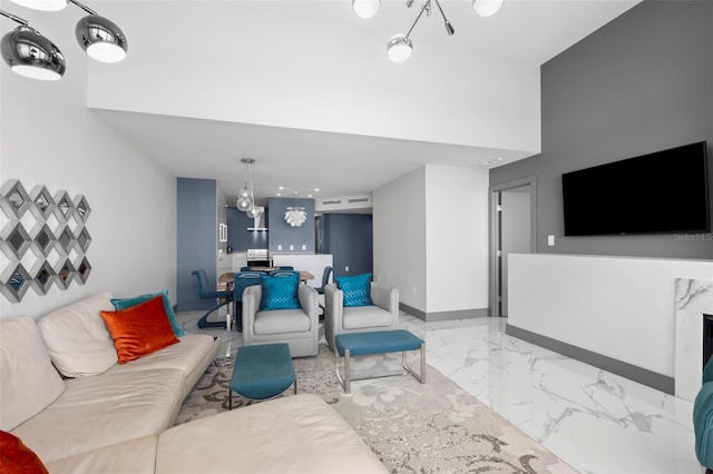 5153 Isla Key Blvd S Unit 415, Saint Petersburg, FL 33715 - living area with marble finish floors and baseboards