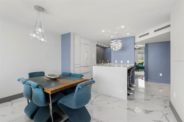 5153 Isla Key Blvd S Unit 415, Saint Petersburg, FL 33715 - dining room featuring recessed lighting and light marble finish flooring