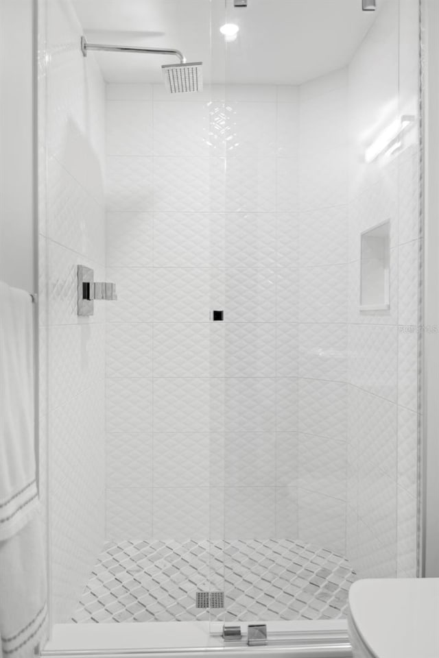 5153 Isla Key Blvd S Unit 415, Saint Petersburg, FL 33715 - full bathroom with toilet and a stall shower