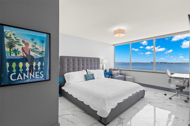 5153 Isla Key Blvd S Unit 415, Saint Petersburg, FL 33715 - bedroom with a water view and marble look tiles