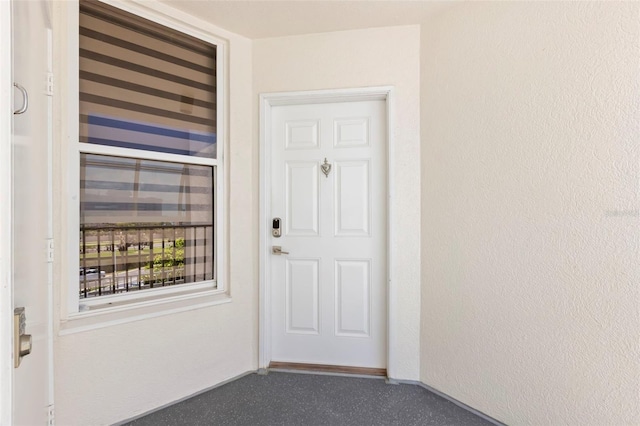 5153 Isla Key Blvd S Unit 415, Saint Petersburg, FL 33715 - doorway to property with stucco siding
