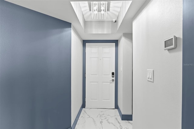 5153 Isla Key Blvd S Unit 415, Saint Petersburg, FL 33715 - entryway featuring light marble finish floors and a chandelier