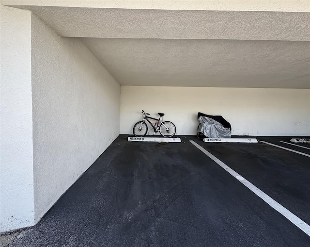 5153 Isla Key Blvd S Unit 415, Saint Petersburg, FL 33715 - garage featuring a textured wall