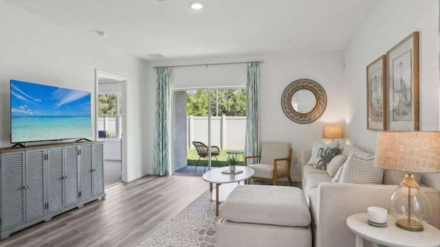 4319 Sand Dollar Way, Zephyrhills, FL 33541 - living area featuring wood finished floors and baseboards