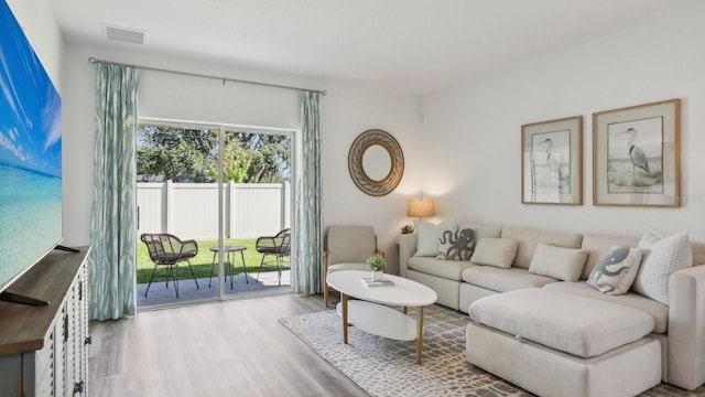 4319 Sand Dollar Way, Zephyrhills, FL 33541 - living room with wood finished floors