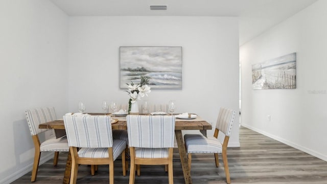 4302 Sand Dollar Way, Zephyrhills, FL 33541 - dining space featuring wood finished floors and baseboards