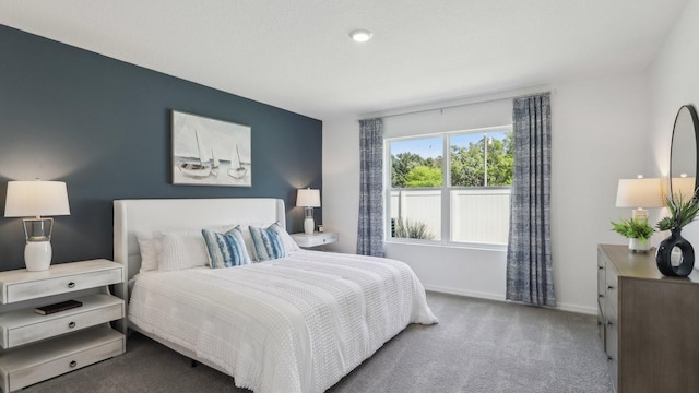 4302 Sand Dollar Way, Zephyrhills, FL 33541 - carpeted bedroom with baseboards
