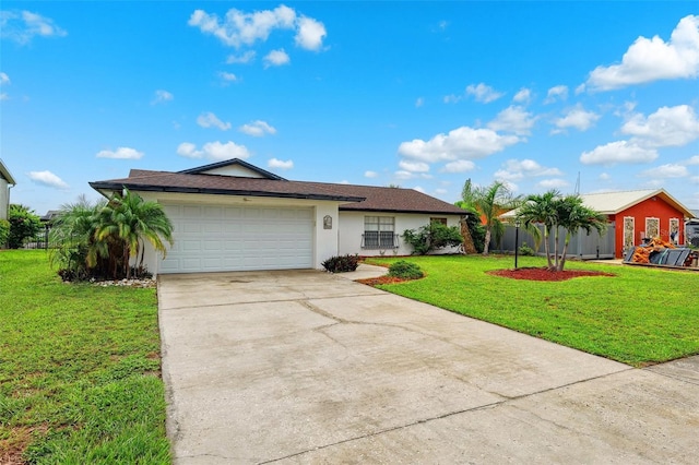 6521 Bimini Ct, Apollo Beach, FL 33572 - ranch-style home featuring concrete driveway, a front yard, a garage, and stucco siding