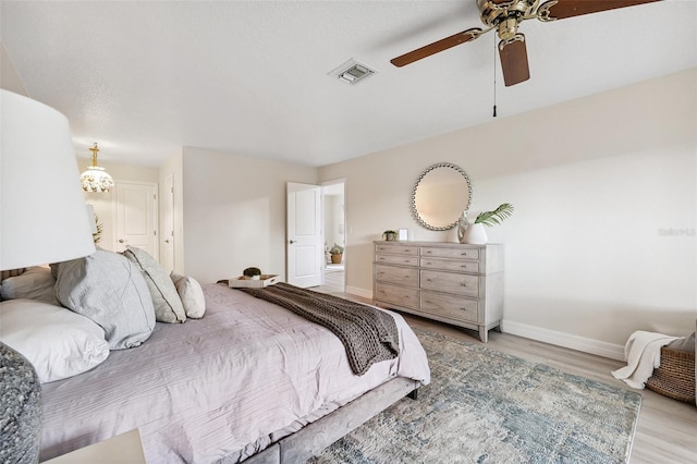 6521 Bimini Ct, Apollo Beach, FL 33572 - bedroom featuring light wood-type flooring and a ceiling fan