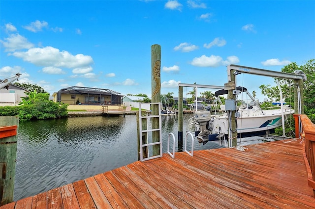 6521 Bimini Ct, Apollo Beach, FL 33572 - dock area featuring boat lift and a water view