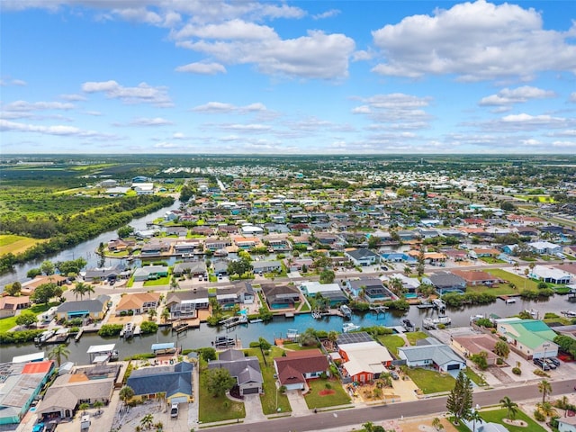 6521 Bimini Ct, Apollo Beach, FL 33572 - aerial perspective of suburban area featuring a large body of water