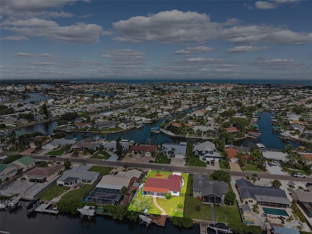 6521 Bimini Ct, Apollo Beach, FL 33572 - aerial perspective of suburban area with a large body of water and property boundaries highlighted