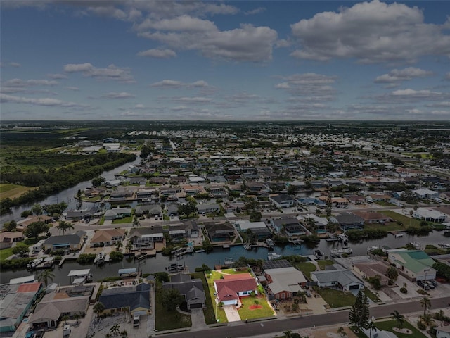 6521 Bimini Ct, Apollo Beach, FL 33572 - aerial perspective of suburban area with a nearby body of water and property parcel outlined
