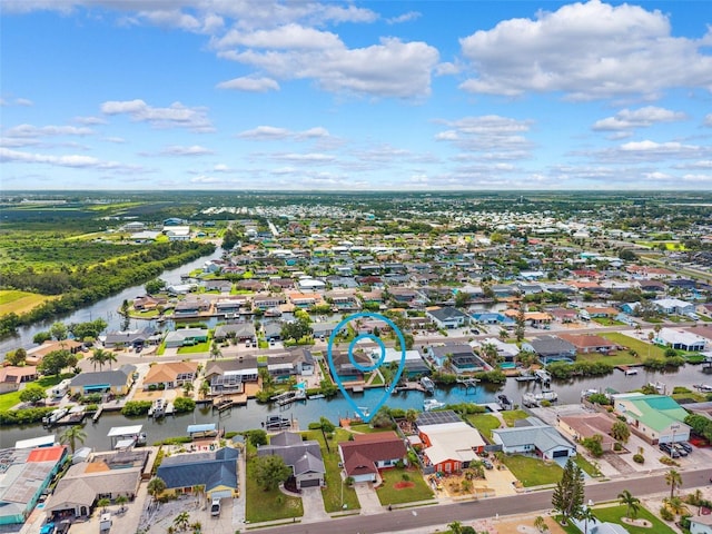 6521 Bimini Ct, Apollo Beach, FL 33572 - aerial perspective of suburban area featuring a large body of water