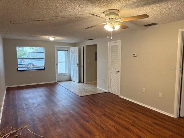 101 Lake Ave NE Unit 121, Largo, FL 33771 - spare room featuring wood finished floors, ceiling fan, and a textured ceiling