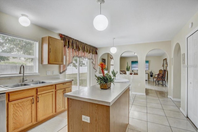 10437 River Bream Dr, Riverview, FL 33569 - kitchen featuring light countertops, plenty of natural light, and decorative light fixtures