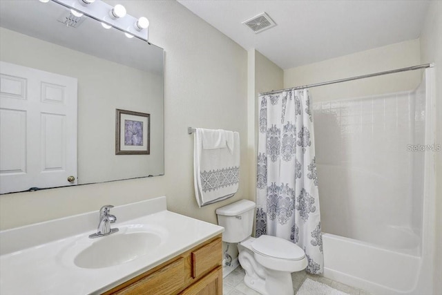 10437 River Bream Dr, Riverview, FL 33569 - full bathroom featuring vanity, shower / bath combo with shower curtain, and tile patterned floors