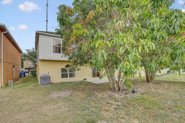 10437 River Bream Dr, Riverview, FL 33569 - back of house with a yard