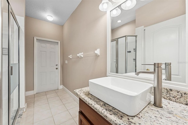 25946 Buckthorn Ave, Land O Lakes, FL 34639 - full bath with a stall shower, tile patterned floors, and vanity