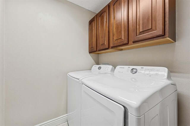 25946 Buckthorn Ave, Land O Lakes, FL 34639 - washroom featuring separate washer and dryer and cabinet space