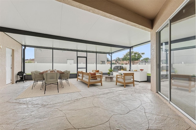 25946 Buckthorn Ave, Land O Lakes, FL 34639 - sunroom / solarium featuring beam ceiling