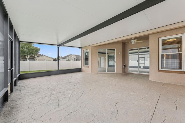 25946 Buckthorn Ave, Land O Lakes, FL 34639 - unfurnished sunroom with healthy amount of natural light and beamed ceiling