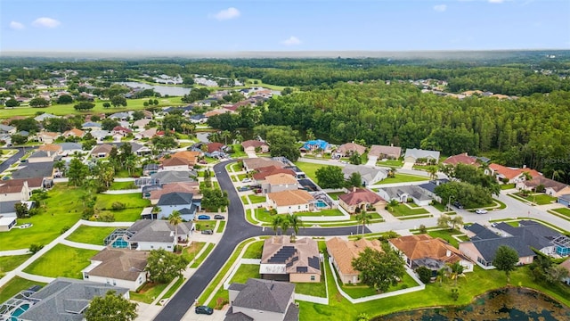 25946 Buckthorn Ave, Land O Lakes, FL 34639 - aerial overview of property's location with nearby suburban area and a large body of water
