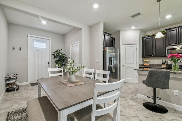6825 Citrus Creek Ln, Tampa, FL 33625 - dining room featuring baseboards and recessed lighting
