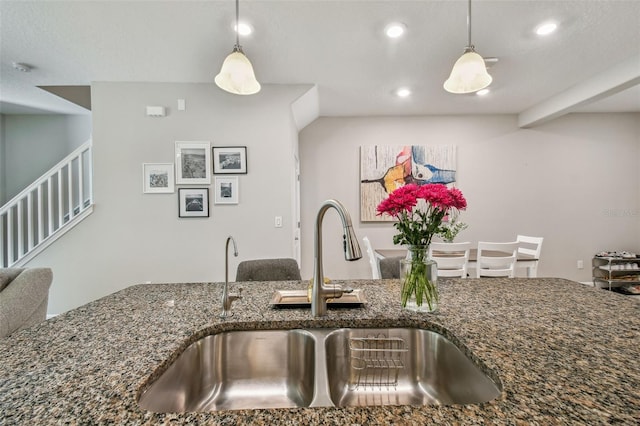 6825 Citrus Creek Ln, Tampa, FL 33625 - kitchen featuring pendant lighting, recessed lighting, and dark stone countertops