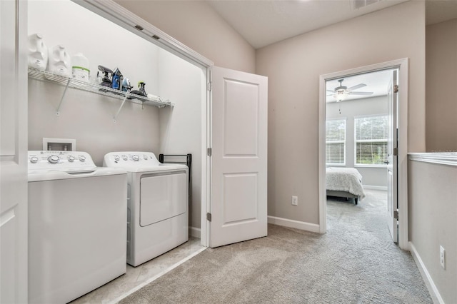 6825 Citrus Creek Ln, Tampa, FL 33625 - washroom featuring washing machine and dryer, a ceiling fan, and light carpet