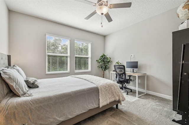 6825 Citrus Creek Ln, Tampa, FL 33625 - carpeted bedroom with a desk, a ceiling fan, and a textured ceiling