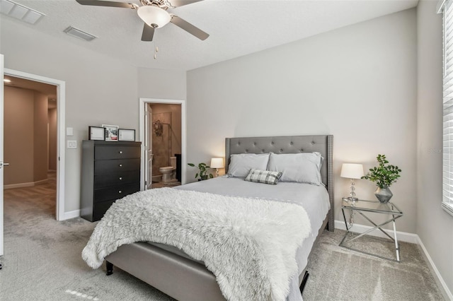 6825 Citrus Creek Ln, Tampa, FL 33625 - bedroom featuring carpet flooring, multiple windows, ensuite bathroom, and a ceiling fan