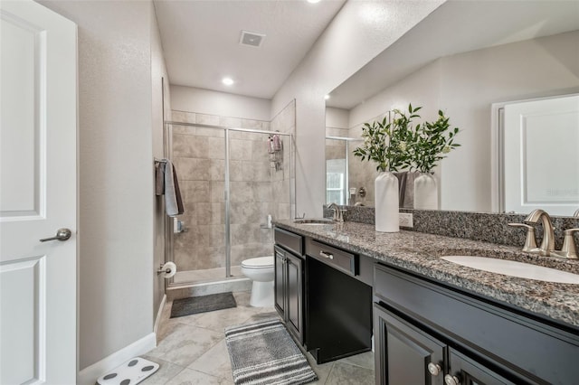 6825 Citrus Creek Ln, Tampa, FL 33625 - full bathroom with double vanity, a shower stall, and tile patterned floors