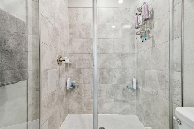 6825 Citrus Creek Ln, Tampa, FL 33625 - bathroom with toilet and a shower stall