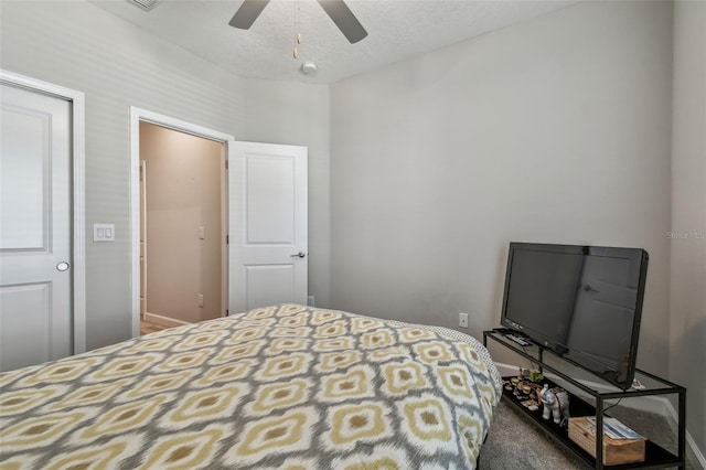 6825 Citrus Creek Ln, Tampa, FL 33625 - bedroom featuring a ceiling fan and a textured ceiling
