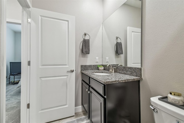 6825 Citrus Creek Ln, Tampa, FL 33625 - half bathroom featuring vanity and toilet